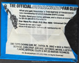 Back of a trading card featuring text about the Star Wars Fan Club and a small figure on a blue border.