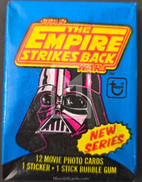 Trading card pack featuring Darth Vader with 'The Empire Strikes Back' branding on a blue background.