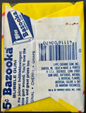 Bazooka bubble gum packaging with a yellow border and visible branding.