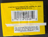 Yellow label with bar code and text on a black background