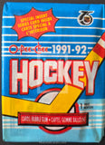 O-Pee-Chee 1991-92 hockey trading card pack with blue and red design.