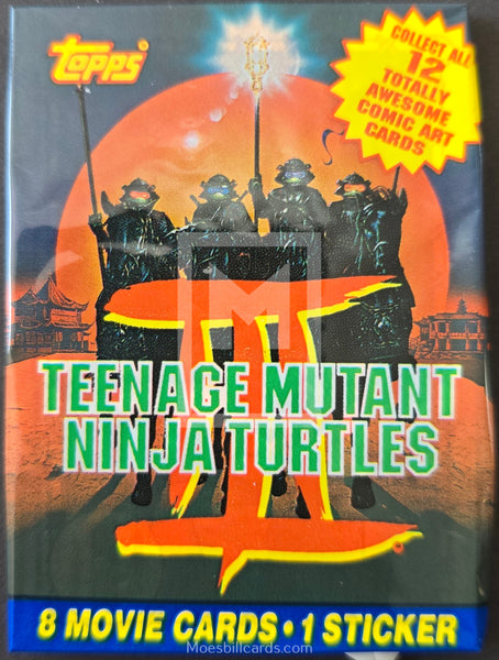 Topps Teenage Mutant Ninja Turtles trading card book with four turtles on a sunset background.
