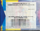 Back of a Topps trading card packaging with branding and address information.
