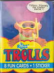 Packaging of Russ Trolls cards with a cartoon character and text on a blue and yellow background.