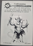 Card featuring a black and white illustration of a warrior with weapons, text about a mammoth, and branding information.