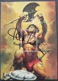 Illustration of a muscular character holding weapons with a signature overlay
