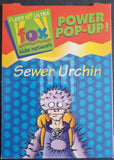 1995-Fleer-Ultra-FoxKidsNetworks-Insert-Trading-Card-Pop-Up-3-of-24-The-Tick-Sewer-Urchin-Trading-Card-Front