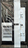 Packaging with printed text and a barcode, featuring 'Printed in Canada' and product details.