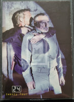 2003 Comic Images 24 Season 1 and 2 memorabilia Card M5 Victor Drazens Prison Uniform Trading Card Front