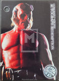 Trading card of a muscular figure with red skin and helmet, featuring branding and text.