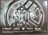 Hellboy movie logo on a metallic background with branding information.