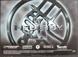Hellboy logo on a metallic background with branding of Revolution Studios, Columbia Pictures, and Dark Horse Comics.