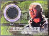 Stargate SG-1 trading card featuring Teal'c with green and gray background
