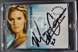 An autographed collectible trading card of Shannon Wrightford as Magic Shop, sealed in a clear plastic protective case. The card features a portrait of the blonde actress, her name printed vertically, and a prominent black ink signature across the front.