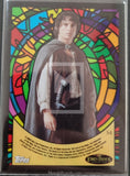 Trading card with a character in a colorful stained glass frame, featuring Topps and The Lord of the Rings branding.