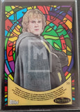 Trading card with a character in a gray robe against a colorful stained glass background, featuring Topps branding.