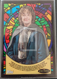 Trading card with a character from 'The Lord of the Rings' series, featuring a colorful stained glass border.