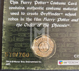 Harry Potter-themed card with gold emblem and text about costume material from 'Order of the Phoenix'.