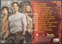 Movie poster with three characters and promotional text about a prehistoric adventure film.
