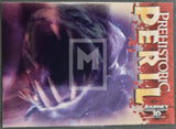 Card with a prehistoric creature design and 'Prehistoric Peril' text on a purple and red background.