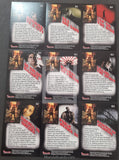 Collection of horror-themed trading cards with images and text on a black background