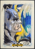 Batman illustration with colorful abstract background, Rittenhouse Archives logo, and Batman logo.