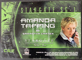 Trading card for 'Stargate SG-1' featuring Amanda Tapping as Samantha Carter, with a green and black design.