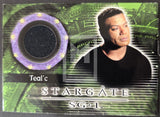 Trading card featuring Teal'c from Stargate SG-1 with green and black design elements.
