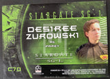 Trading card featuring Des1ree Zurowski from Stargate SG-1 with a green border and character image.
