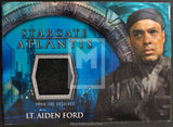 Stargate Atlantis trading card featuring Lt. Aiden Ford with a blue background and Stargate design.