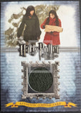 Trading card featuring characters from 'Harry Potter' with a snowy background