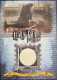Harry Potter collectible card with a costume patch and scene from the movie.