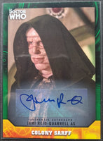 Trading card of a character from 'Doctor Who' with a signature on a green border
