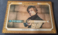 Trading card featuring Tyrion Lannister from 'Game of Thrones' with a sword, framed by decorative elements.