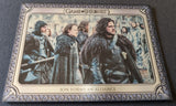 Trading card featuring characters from 'Game of Thrones' with decorative border