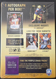 Trading card pack with football-themed cards and promotional text on a gold background