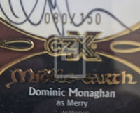 Close-up of a Middle-earth collectible card with branding and text.