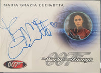 Card featuring Maria Grazia Cucinotta's signature and a James Bond logo, with 'The World Is Not Enough' text.