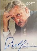 Card featuring a man with gray hair and a signature, with '007' branding.