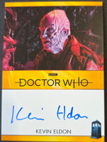 Doctor Who trading card featuring Kevin Eldon with a signature, set against a dark background.