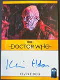 Doctor Who trading card featuring Kevin Eldon with a signature, set against a dark background.