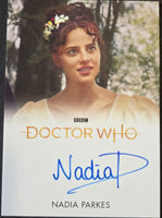 Card featuring a woman with a floral headpiece, 'Doctor Who' branding, and the name Nadia Parkes.
