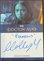 Trading card featuring a character from 'Doctor Who' with an autograph and branding.