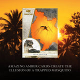 A Jurassic Park Velociraptor trading card is centered against a dramatic sunset background with palm tree silhouettes. The card features an amber-colored map design with a mosquito illustration and a small inset showing a dinosaur head.