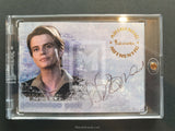 Trading card featuring a person's portrait and signature on a gray background