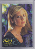 Trading card featuring a character from 'Buffy the Vampire Slayer' with a colorful border.