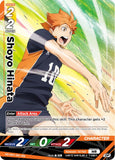 A collectible trading card featuring the anime character Shoyo Hinata from Haikyu!! in a dynamic volleyball pose. The card has a vibrant green and yellow motion-blur background, with text indicating 'Shoyo Hinata', 'SERVE 2', 'SET 2', and attack points.