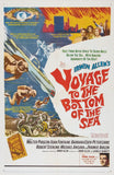 Vintage movie poster for 'Voyage to the Bottom of the Sea' with dramatic artwork and text.