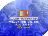 Promotional image for 'Saturday Morning Cards Volume 3: Ken vs Balrog' dual card box with SMC logo and Capcom branding.