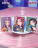 Three illustrated K-pop trading cards featuring HUNTRIX members are displayed on a pink vinyl record, with the KAYOU and NETFLIX logos at the top of the image.
